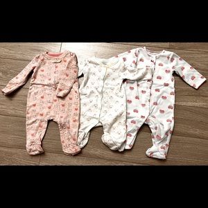 Trio of footed pajamas